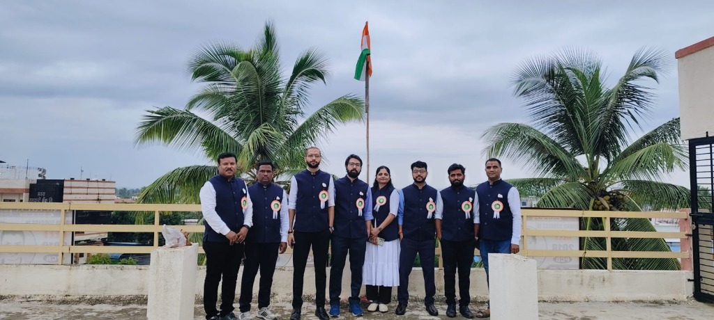 Faculty and Staff Group Photo with National Flag